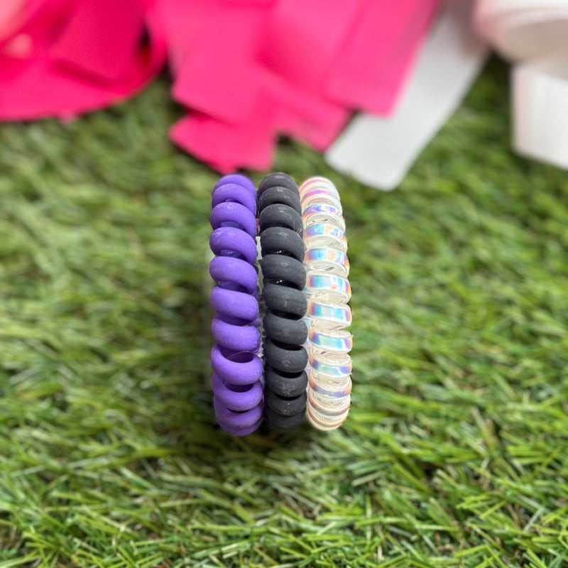 hotline coil hair ties in purple, white and black