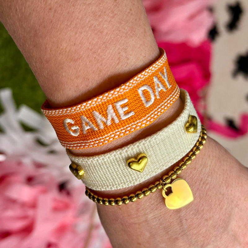 embroidered GAME DAY tassel bracelet in orange