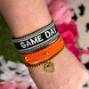 embroidered GAME DAY tassel bracelet in black