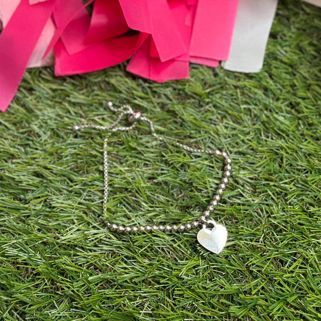 dangle heart bracelet in silver