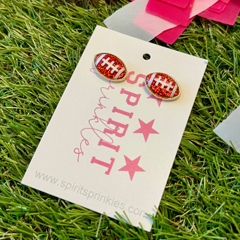 glitter football stud earrings in red