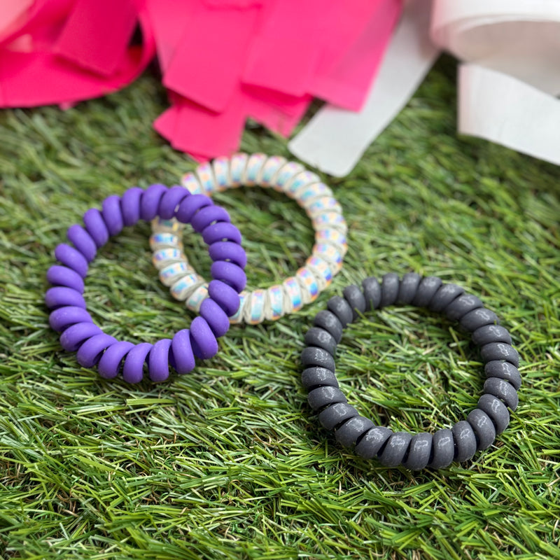 hotline coil hair ties in purple, white and black